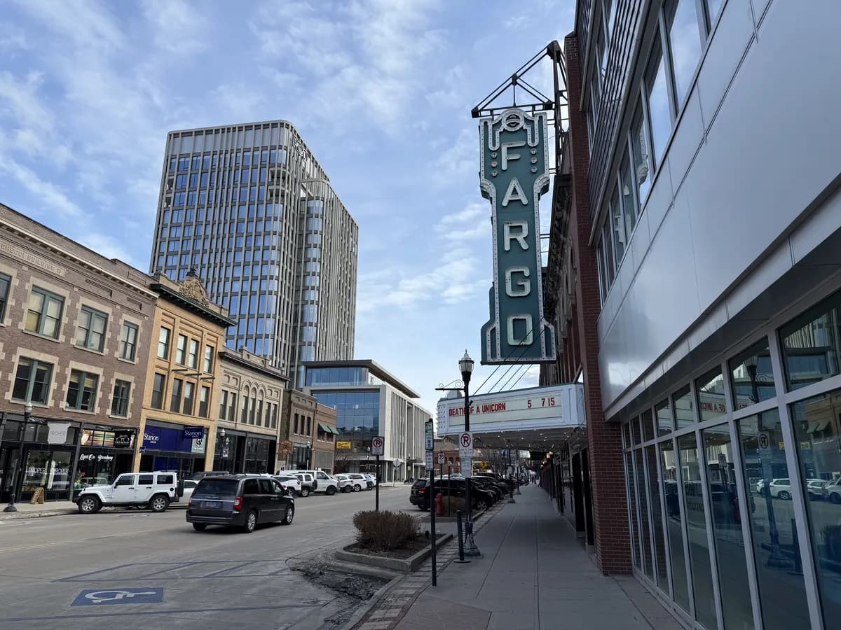 Broadway looking south in downtown Fargo, the Fargo Theatre sign projecting over the street
